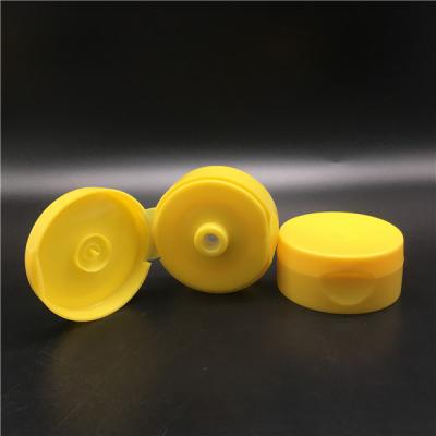 China Non Puddle Plastic Flip Cap With Silicon Valve for Honey Bottle for sale