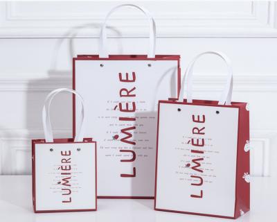 China LONCHENG Recyclable Mass Production Of Paper Clothing Bags, Shopping Bags, Gift Bags for sale