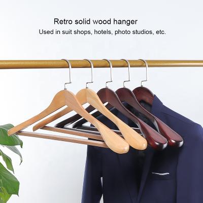 China Burlywood Minimalist Heavy Duty Metal Coat Hangers with Natural Wood Trouser Bar for Clothes for sale