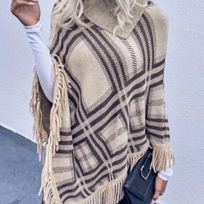 China Anti-pilling Striped Fringe Trim Ribbed Poncho Women Sweaters Knitted Top Sweater Shawl for sale