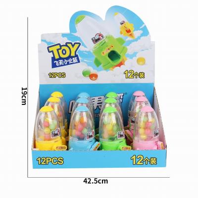 China Promotional Rocket Shaped Candy Machine Transparent Toys Candy Machine Toy Products Children's Candy Rack for sale