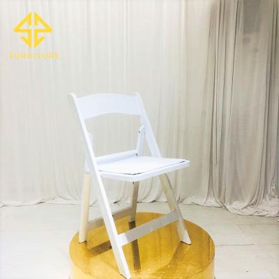 China Modern wholesale cheap wedding uesd resin white folding outdoor dining chair for sale