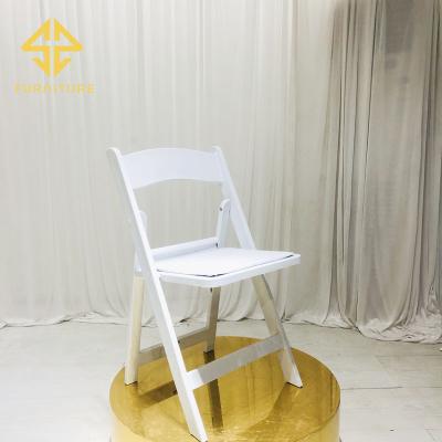 China SAWA Modern Wholesale Modern Outdoor Furniture White Resin Folding Chairs For Wedding Banquet for sale