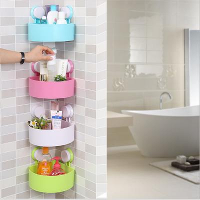 China Creative plastic kitchen&bathroom storage shelf corner wall mounted storage rack sucker rack for sale