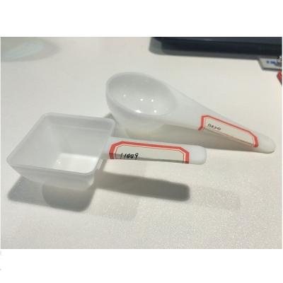 China Viable White Plastic Spoon 30ml Disposable Powder Scoop Spoon Measuring Powder Detergent Plastic Spoon Maker for sale