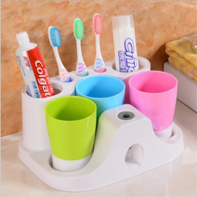 China Viable Lazy Automatic Toothpaste Couple Wash Toothbrush Holder Sucker Toothbrush Holder Tooth Holder for sale