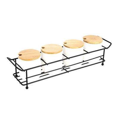 China High Quality Viable Black Kitchen Condiment Rack Kitchen Countertop Seasoning Storage Rack Seasoning Rack for sale