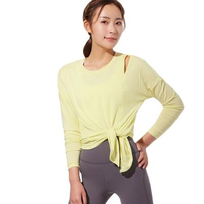 China Breathable Womens Workout Tops Long Sleeve Sporty Activewear T Shirts Side Slit for sale