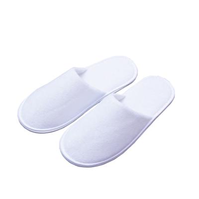 China Custom Soft Non Woven Fabric Wholesales Hotel Disposable Slippers For Men for sale