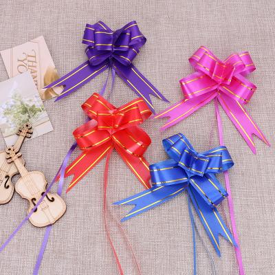 China 50pcs Plastic Pull Bow Gift Ribbons Flower Wraps Wedding Birthday Decoration Happy New Year Christmas Decor for sale