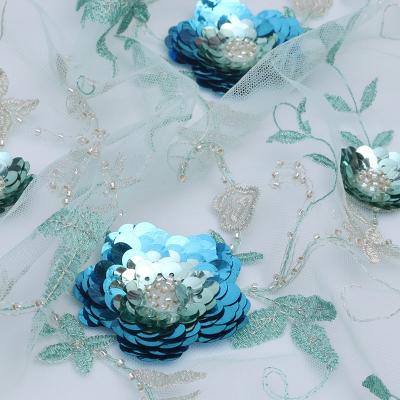 China Blue Wedding Dress Fabric New Style Sustainable 3D Flower Sequin Embroidery Lace Fabric Even for sale