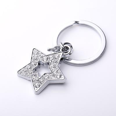 China Souvenir Gifts Promotion Most Welcomed Silver Custom Rhinestone Star Shape Metal Key Chain for sale