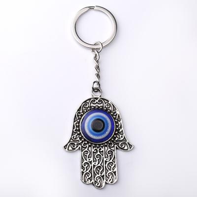 China Souvenir Gifts Promotion New Arrival Palm Evil Eye Antique Silver Zinc Alloy Key Chain for sale