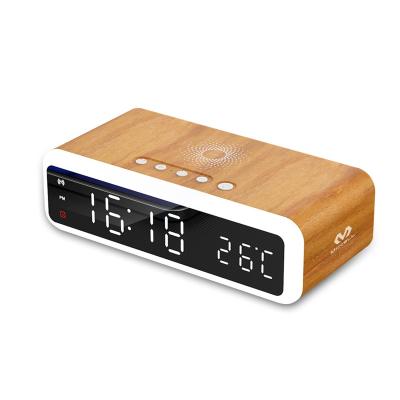 China Multifunctional Digital Charger Wireless Alarm Clock Led 15w Qi Fast Charging 4 in 1 Wooden Type Alarm Clock Wireless Charger for sale