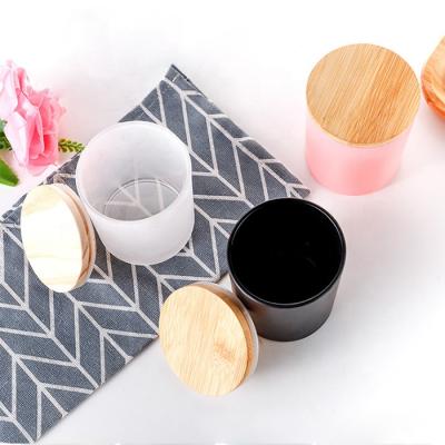 China Good quality eco-friendly frosted empty wide mouth candle glass jar with wooden lid for candle making for sale