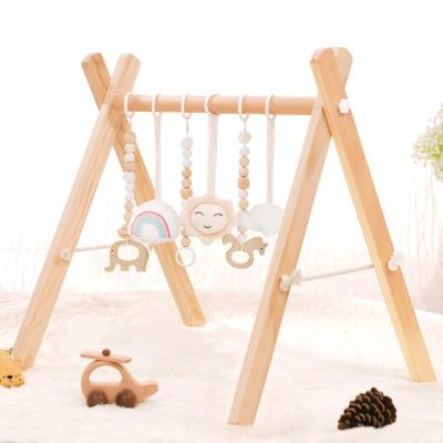 China Inflatable 6 Wooden Hanging Bar Baby Toys Foldable Play Sight Activity Girl and Boy Gym for Newborn Gift for sale