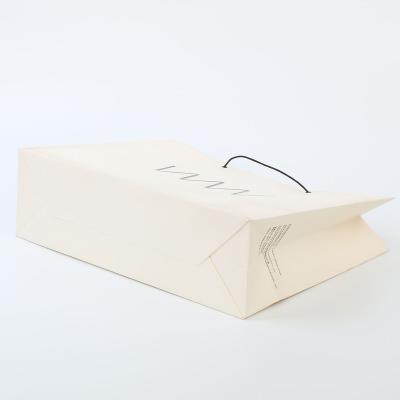 China Recycled Materials Printed Paper Packaging Luxury Gift Shopping Bag With Handle for sale