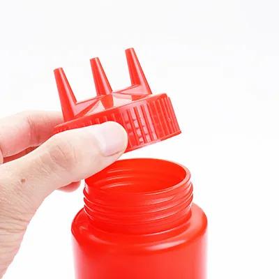 China Home Hotel Restaurant Twist On Lids And Measures For Ketchup Sauce BBQ Three Hands Squeeze Plastic Bottle for sale