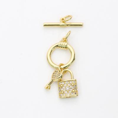 China Clear Spacer Bead CZ Micro Pave 18K Gold Plated Unique Design Lock Shape Toggle Clasp For Bracelet &Necklace Jewelry Making for sale