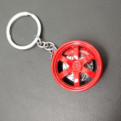 China Promotional Activities Custom Logo Key Rings Car Accessories Business Gift Six Pillar Hub Design Metal Car Key Chains for sale