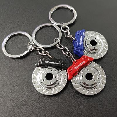 China Customized Wholesale Metal Brand Key Chain Logo Car Key Chain Brake Disc Shaped Car Key Chain for sale