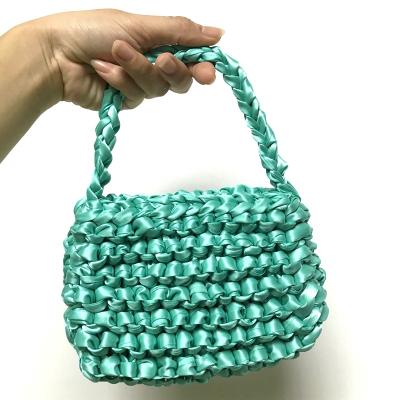 China High Quality Satin Woven Evening Handbag Fashionable Custom Fluorescent Hollow Bag for sale