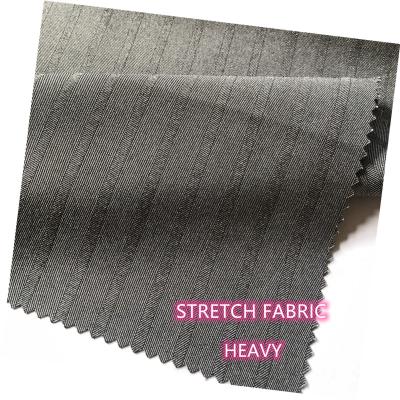 China Cationic Spandex Fabric Breathable Stretch 150D Polyester Stretch Fabric For Pants for sale