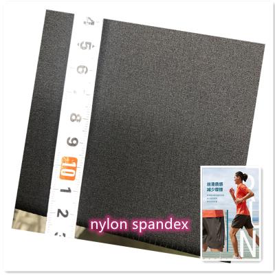 China 70D woven four way woven plaid stretch 4 spandex fabric ripstop nylon fabric for sportswear for sale