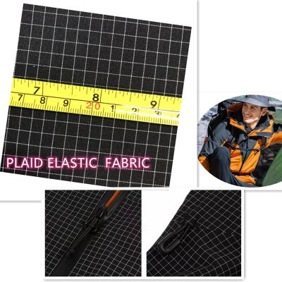 China Stretch Plaid 100D Polyester 4 Way Stretch High Quality Ripstop Fabric For Sportswear And Coat for sale