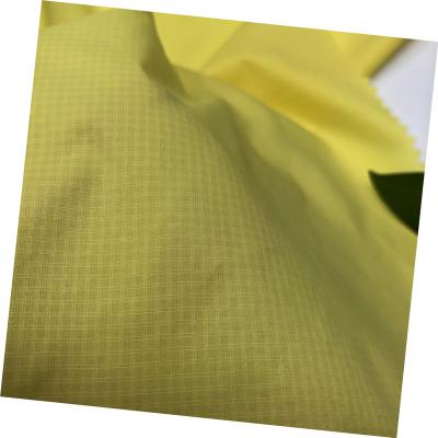 China Stretch factory price 20d 0.2cm nylon plaid ripstop fabric for skin coat and sportswear for sale