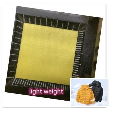 China Downproof 20D down proof factory price 0.08cm plaid 400T ripstop nylon waterproof fabric for down coat for sale