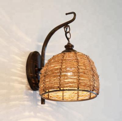 China Modern Vietnam traditional rattan decoration wrought iron wall shelf lamp edison living room led bulb wall sconce lamp for sale