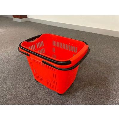 China Wholesale PP Plastic Hand Held Shopping Basket With Four Wheels for sale