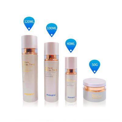 China White Glass Round Personal Care Skin Care Packaging Lotion Bottle With Treatment Pump For Lotion Custom for sale