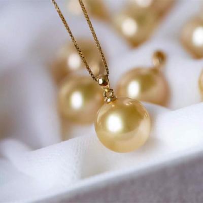 China Nanyang Romantic Sea Gold Wholesale 18K Gold Balls Reflect Gold Glossy Thick Pendant for sale