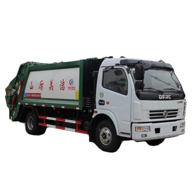 China Environmental Sanitation 6m3 Garbage Compactor Truck Garbage Truck Grades Hydraulic Lift Garbage Truck for sale