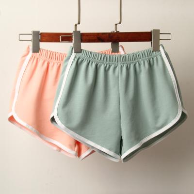 China QUICK DRY Sports Shorts Women's Summer 2021 New Candy Elastic Waist Beach Casual Short Pants Colored Skinny Shorts for sale