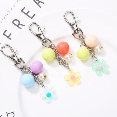 China Color Acrylic Cute Flower Candy Girls Key Chain For Women Resin Bag Car Earphone Cover Trinket Jewelry Wedding Party Gift for sale