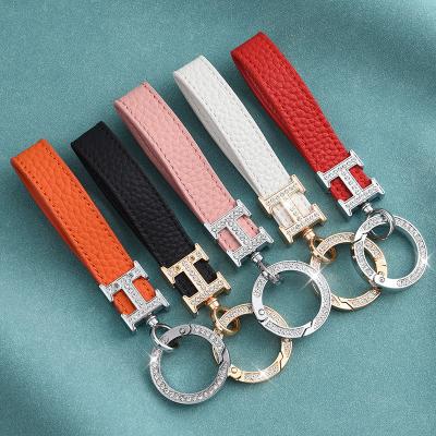 China 360 Degree Rotating Buckle Car Key Chain Horseshoe High End Male Key Chain Leather Key Chain and Female Key Chain for sale