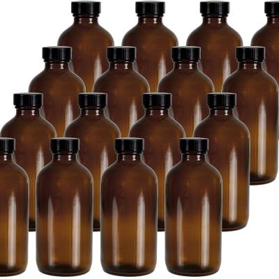 China Cosmetic amber glass bottle amber bottles with black capsamber pill glass bottle 100ml for sale