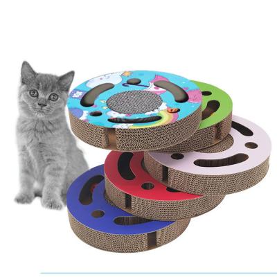 China Round Stocked Cat Scratch Board with Bell BAL Cavity Cat Scratcher Toy Magic Organ Cat Scratching Board for sale