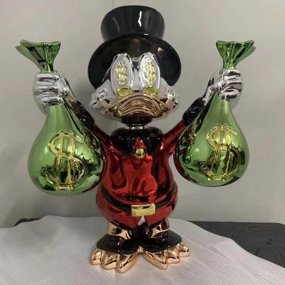 China Modern Duck Bag Money Europe Hand Resin Sculpture Decorative Pop Art Statues Wholesale Custom Home Decor for sale