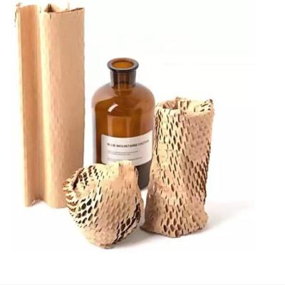 China Recycled Materials Honeycomb Kraft Paper Honeycomb Cushioning Wrap Roll For Packaging for sale