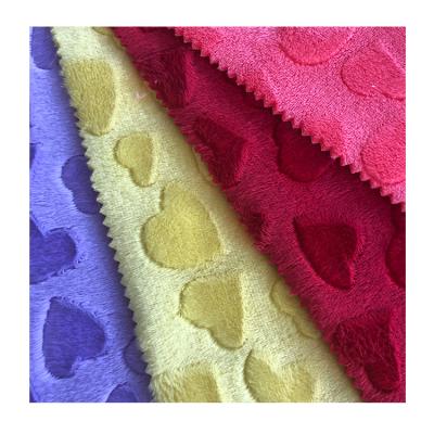 China Super Soft 100% Polyester 240gsm Flame Retardant Embossed Brushed Heart Pattern Minky Plush Fabric For Blanket for sale