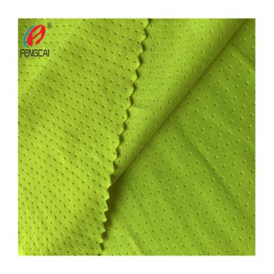 China Bright Yellow Anti Pill 90% Polyester 10%Spandex Weft Knit Single Jersey Butterfly Mesh Fabric for sale