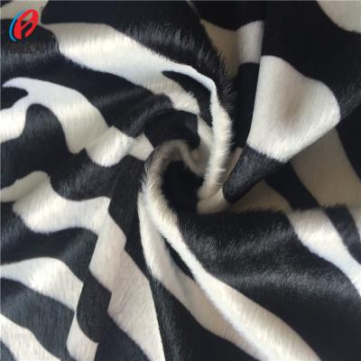 China Zebra-Stripe Style Flame Retardant Velvet Print Animal Skin Material 100% Polyester Micro Velboa Fabric for sale