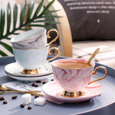 China Viable Wholesale Nordic Bone China Marble Black Tea Cup Gold Balance Teacup and Saucer Set for sale