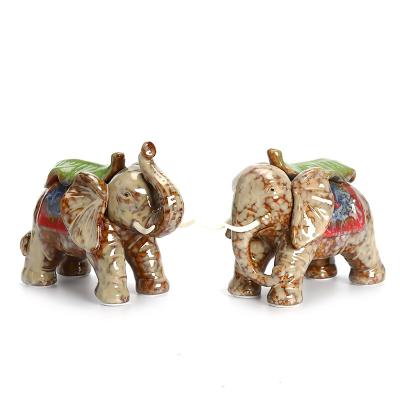 China 2021 New Design Tropical Handmade Gifts And Crafts Ceramic Elephant Pair Home Furnishing for sale