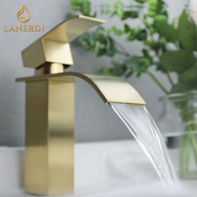 China UPC Faucets Single Handle Waterfall Bathroom Basin Water Faucet Metered Gold Mixer Taps for sale