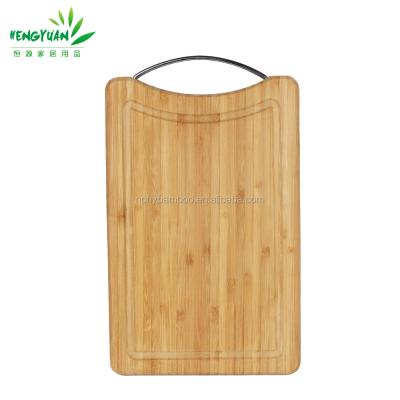 China Sustainable high quality bamboo cutting board with metal handle for sale